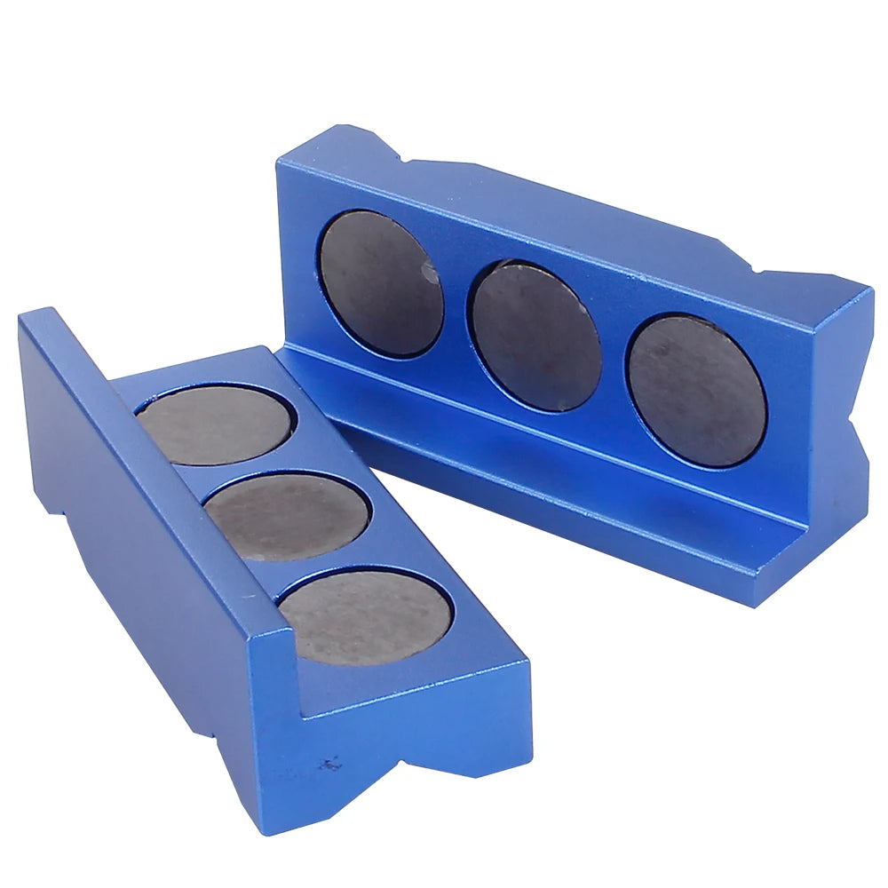 Two blue aluminum magnetic vise jaw inserts with circular openings.