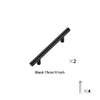 Two black 15cm or 6 inch cabinet handles and four screws are shown.