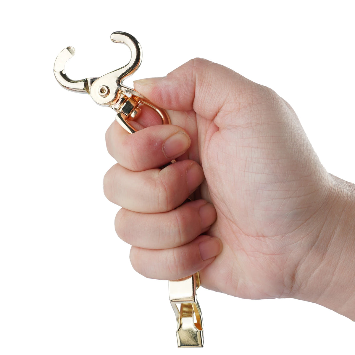 A hand is holding a heavy duty metal glove clip, showing the mechanism and the attached clip.