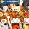 A wooden table is set for parties with various food items and a craft paper roll visible.