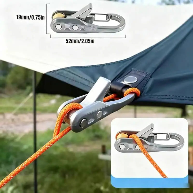 A close-up view of an adjustable aluminum tent rope tensioner clamp and its corresponding rope.