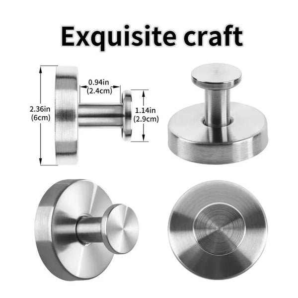 A set of polished stainless steel suction cup hooks for bathroom and shower use.