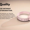 A pink precision ring measuring tool is shown on a light background, highlighting its durable design.