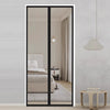 A full-length mirror reflected in a black framed glass door screen for mosquito and fly protection.