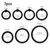 Seven silicone rings of varying diameters are displayed, ranging from 0.9cm to 5.2cm.