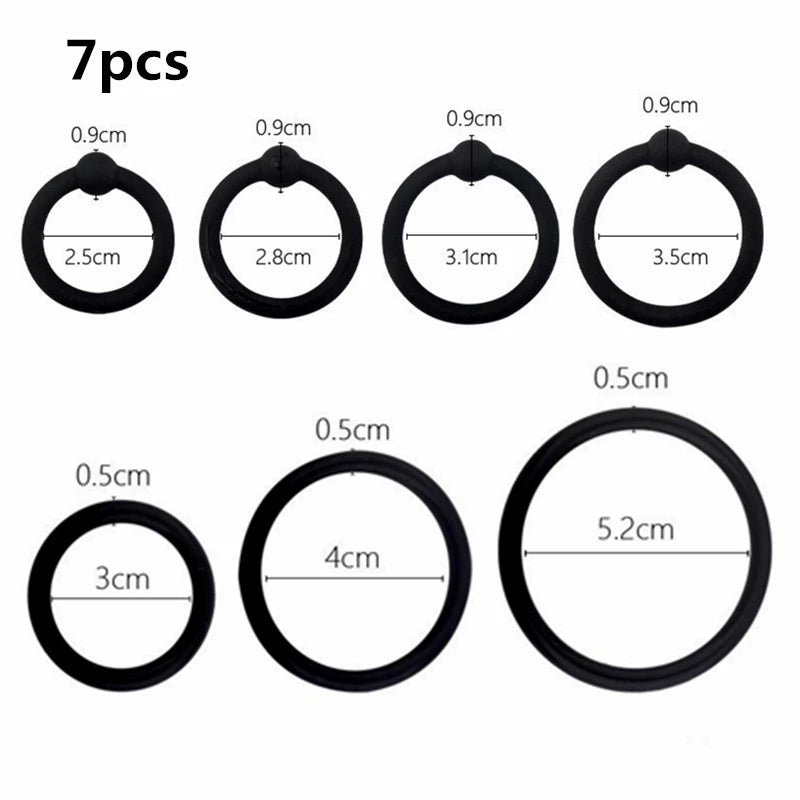 Seven silicone rings of varying diameters are displayed, ranging from 0.9cm to 5.2cm.