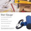 A blue aluminum alloy stair gauge with a black clamp and thumb screws shown next to woodworking tools.
