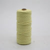 A spool of 100m natural cotton macrame cord in a light yellow color.