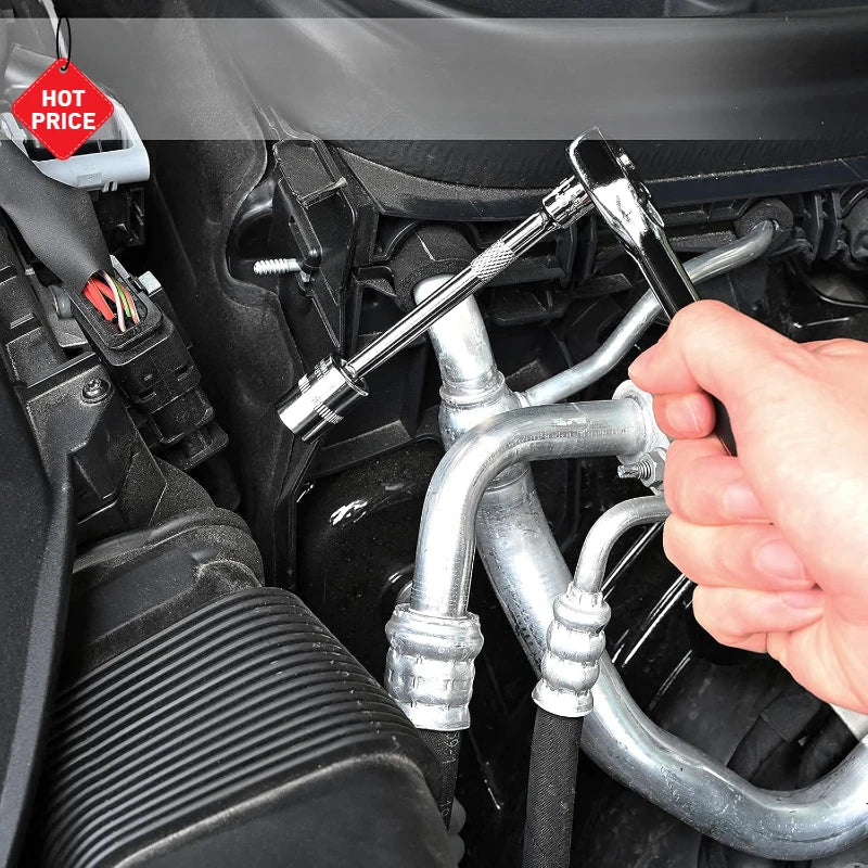 A hand is shown working on an automotive engine component with a socket wrench and screwdriver repair kit.