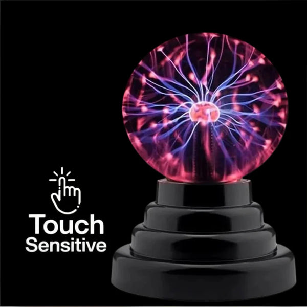 A glowing purple and blue plasma ball LED night light resting on a black base.