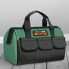 A green and black tool bag with multiple pockets and handles is shown on a wooden surface.