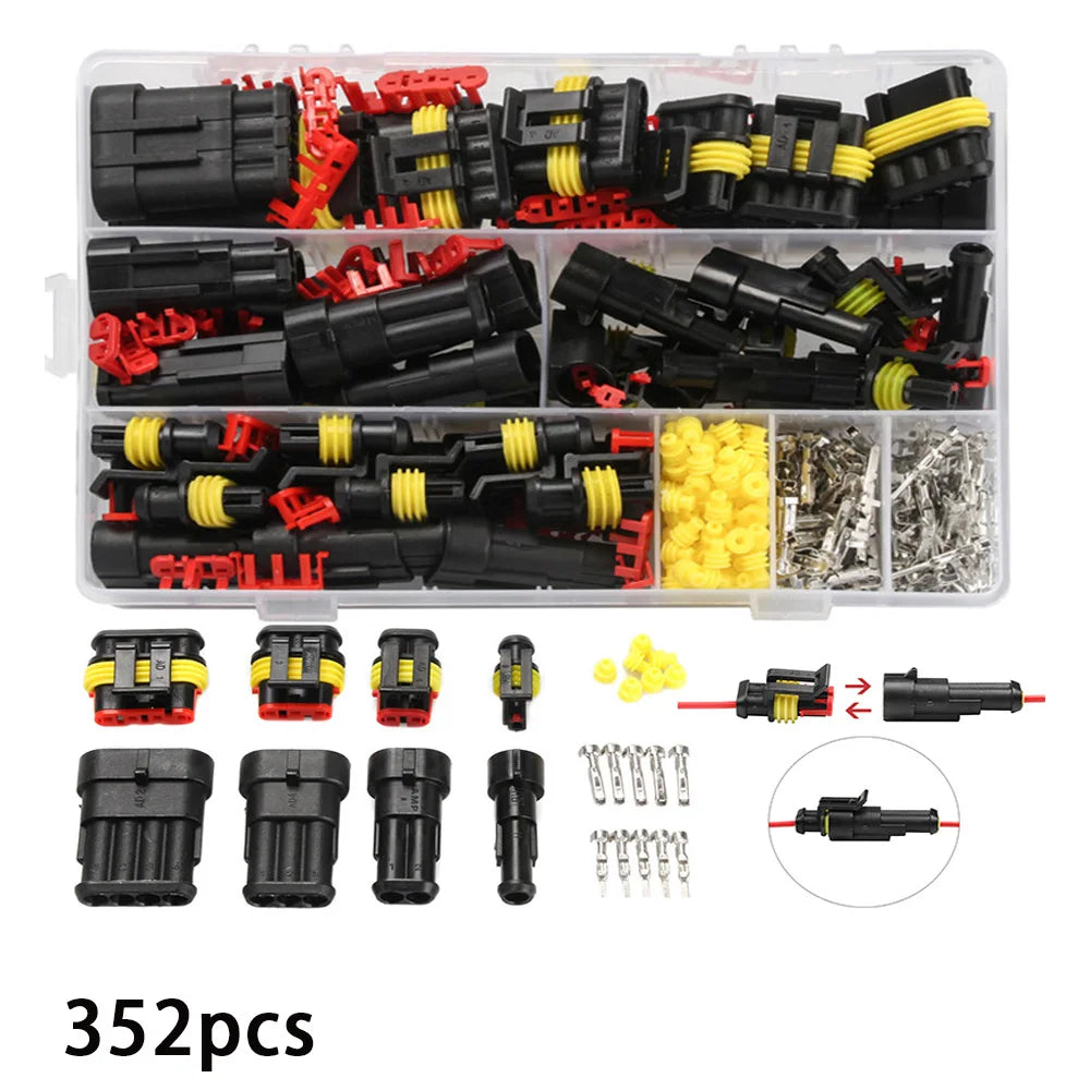 A plastic kit containing various black and red electrical connectors, plugs, and terminals for vehicles and boats.