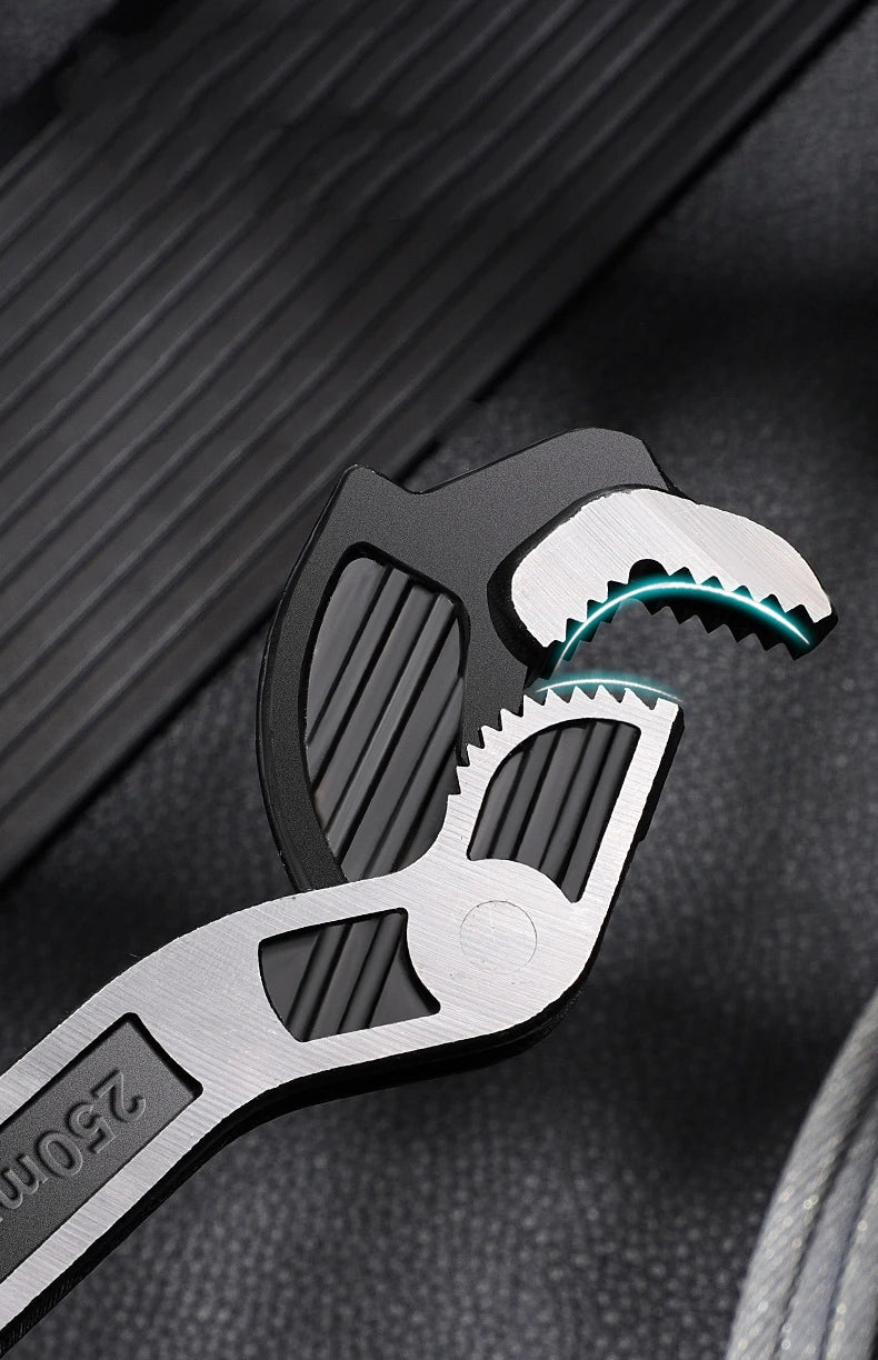 A close-up of a silver adjustable multi-sized locking wrench set with black grips and glowing blue accents.