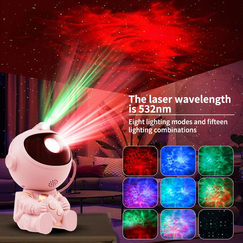 A pink astronaut projector emits red and green laser light beams onto a dark background.