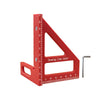 A red drawing line ruler used as a precision angle and layout square for woodworking.