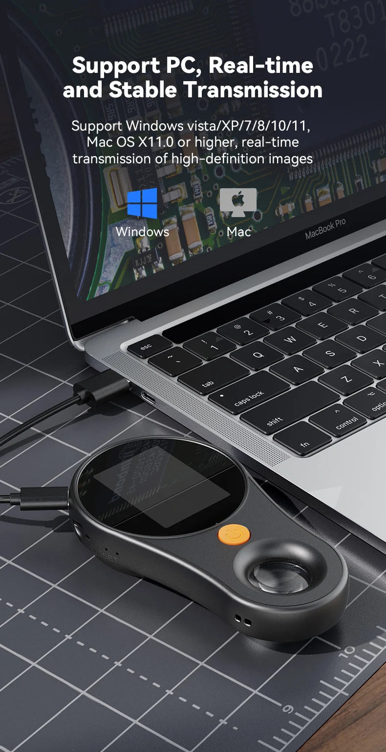 A digital handheld microscope with an LED light is placed on a laptop keyboard and a transparent grid.