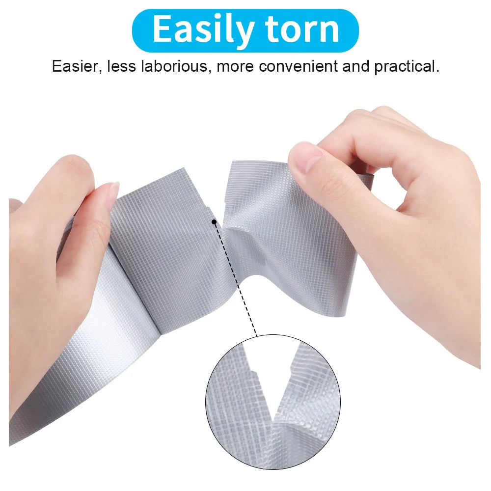 Hands are tearing apart a roll of gray industrial grade multi-color cloth tape to demonstrate its ease of use.
