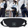 Black linen crossbody waist bag with an ornate circular design shown against a background of people wearing Supreme apparel.