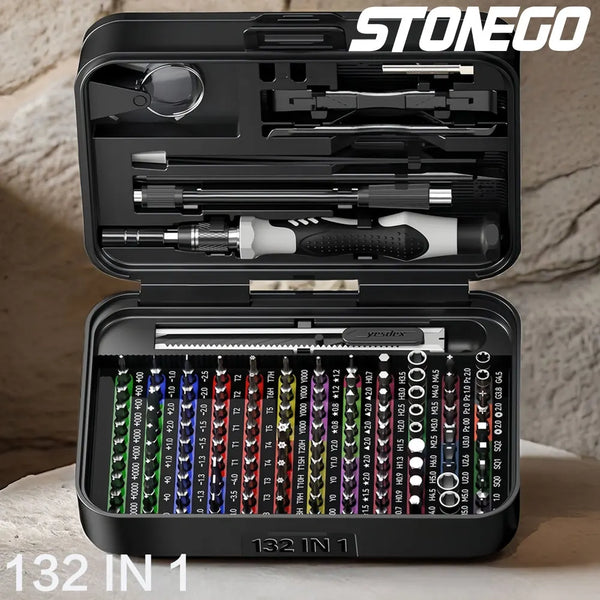 A black precision screwdriver set with magnetic tips is shown open on a light surface.