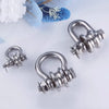 A set of heavy-duty stainless steel buckle pulleys and hardware components on a white background.