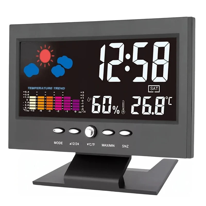 A digital weather station clock displaying the time 12:58, temperature 26.8 degrees Celsius, and a temperature trend graph.