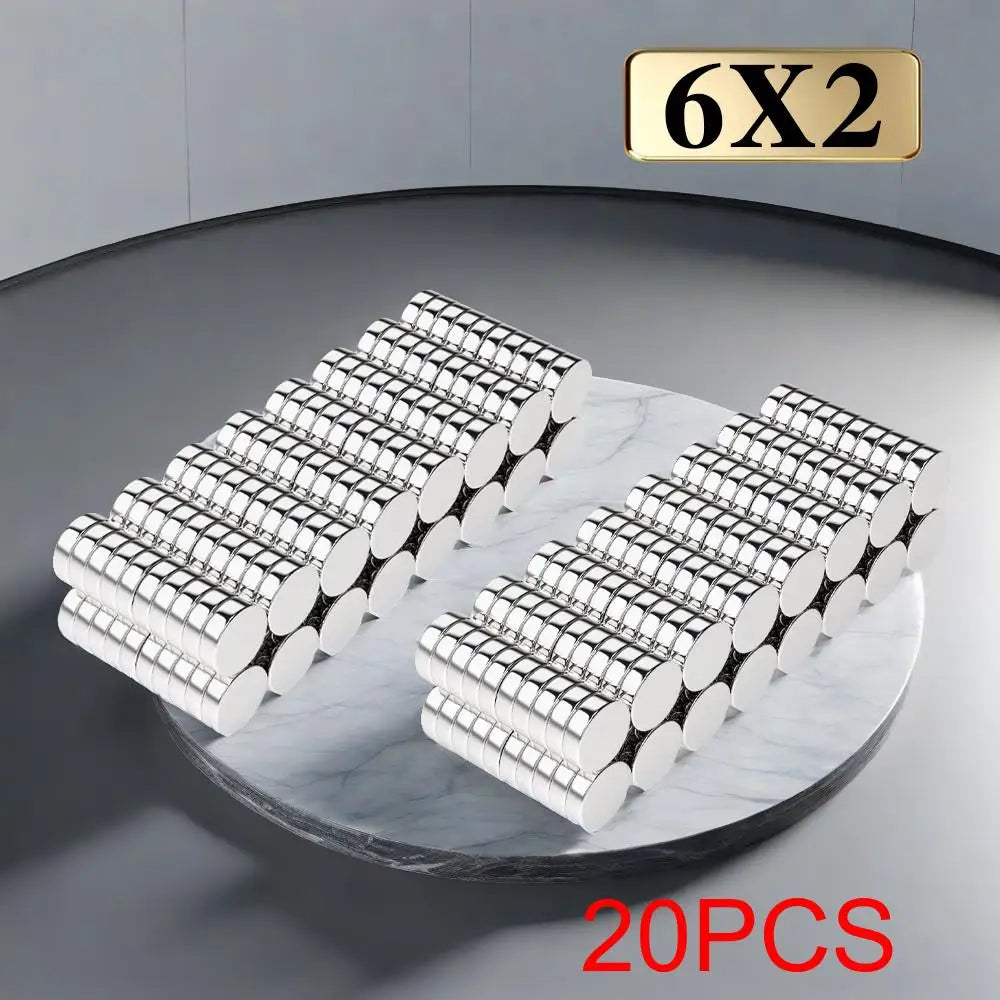 A set of 20 precision refrigerator magnets in a hexagonal shape displayed on a marble surface.
