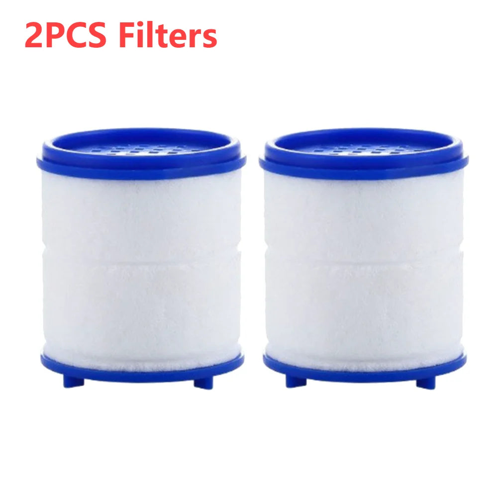 Two blue and white rotating water filters for faucets