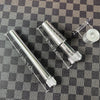 A silver professional ring stretcher and expander tool is shown against a checkered background.