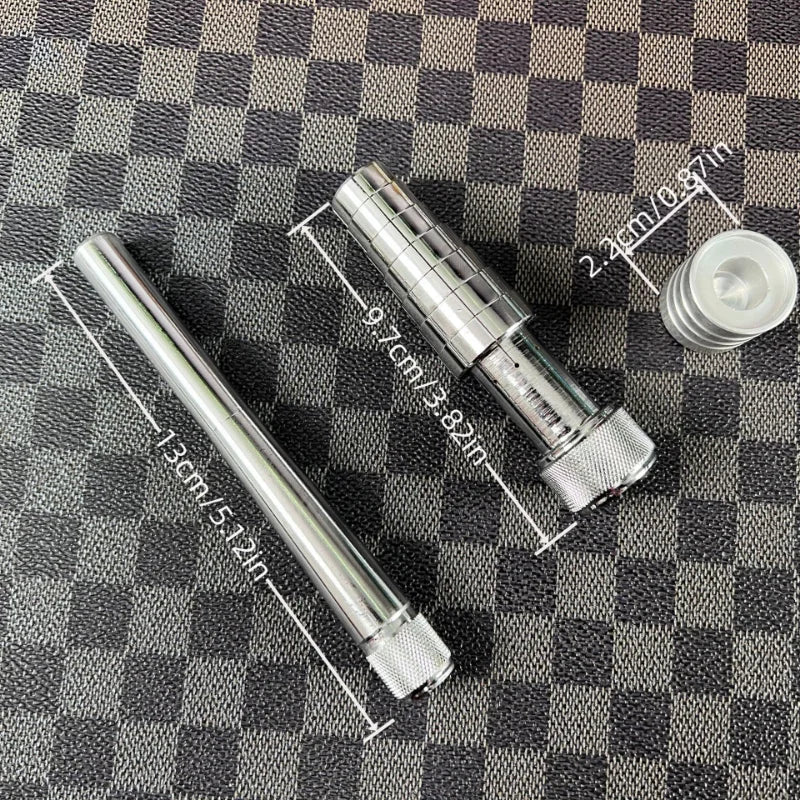 A silver professional ring stretcher and expander tool is shown against a checkered background.