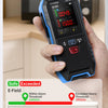 A hand holds a blue and black multi-function environmental detector displaying an alert threshold screen.