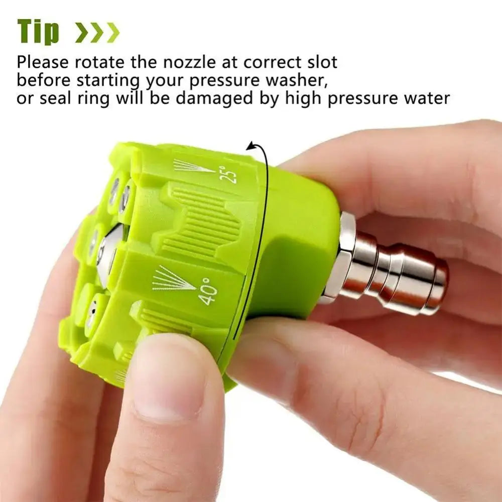 A hand is rotating a green pressure washer nozzle with a 40 degree setting before using it.