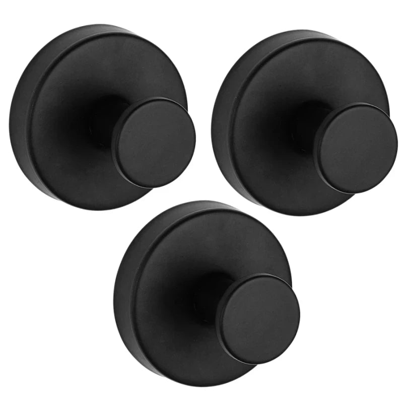 Three black heavy duty stainless steel suction cup shower hooks viewed from above