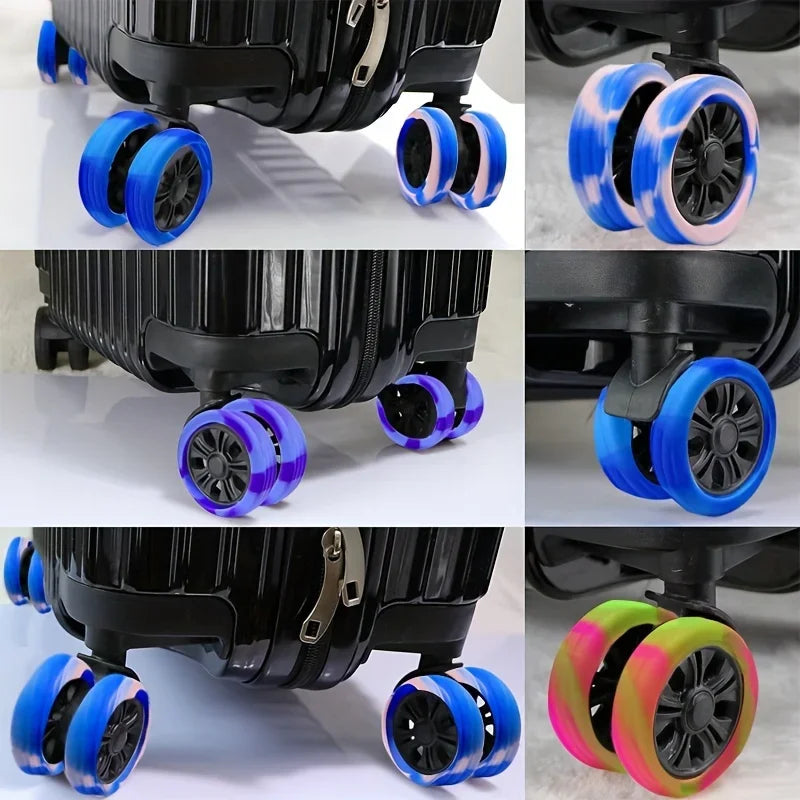 A set of protective luggage wheels in various colors including blue, purple, and pink on a black frame.