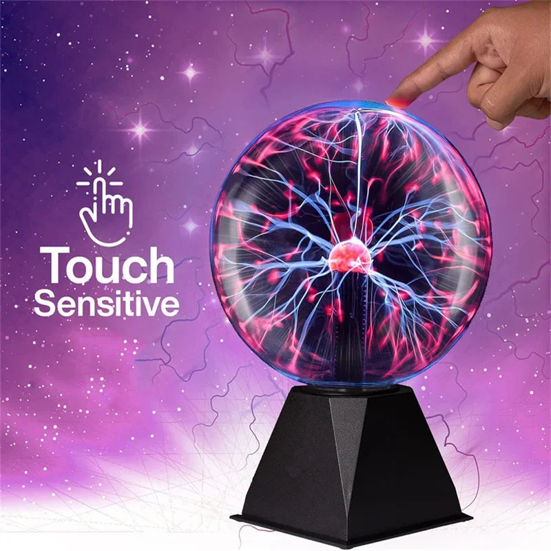 A hand touches a glowing purple and blue plasma ball light display on a black base against a starry background.
