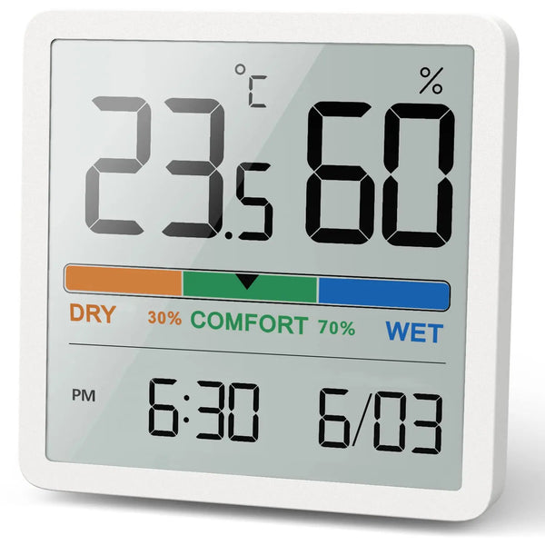 A digital indoor thermometer and hygrometer displaying 23.5°C and 60% humidity, with a bar graph indicating dry, comfort, and