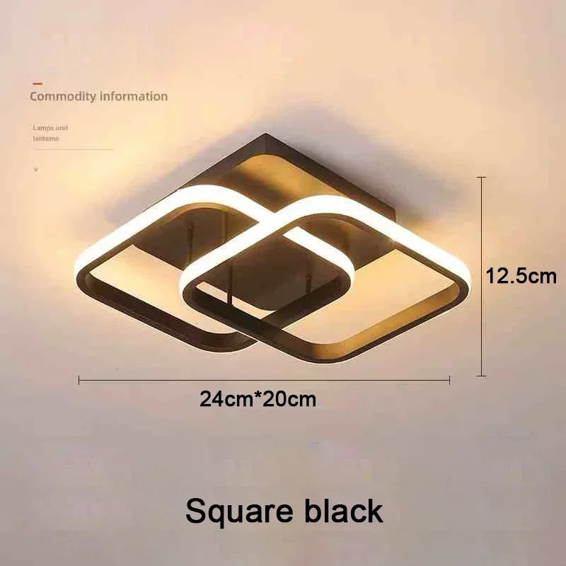 Lámpara de techo moderna negra cuadrada con diseño curvo blanco, montada en la pared.