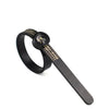 A black precision ring sizer with a magnifying lens and adjustable band.