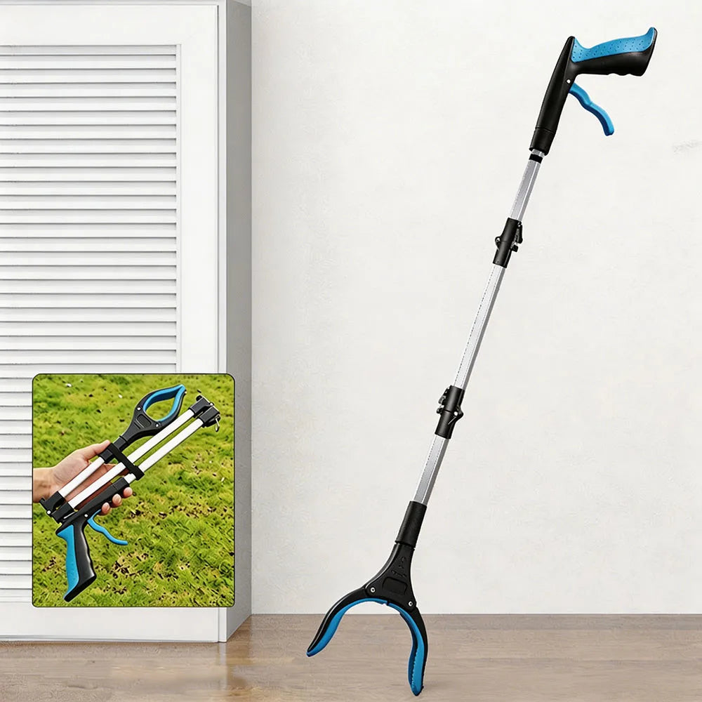 A long, black and silver foldable litter picker and trash reacher tool with a blue handle is shown against a white wall.