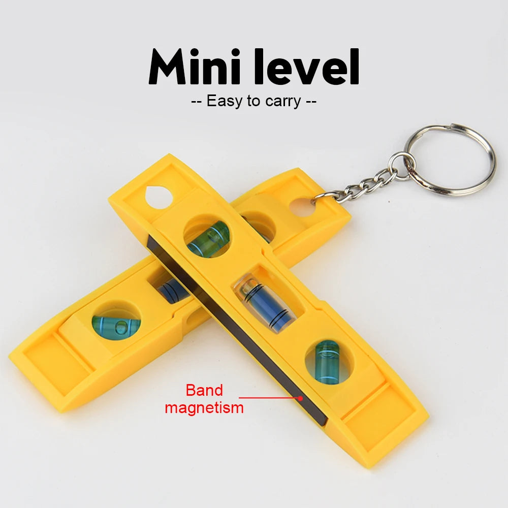 Yellow mini level with a magnetic band and keychain for easy carrying