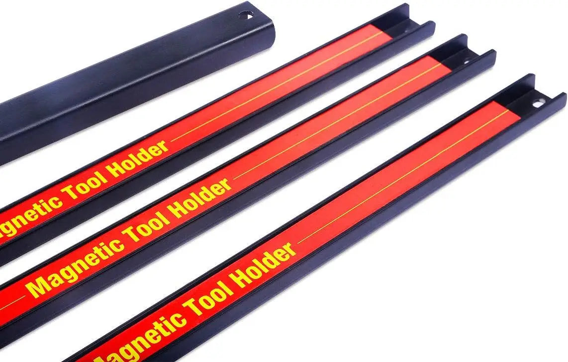 Three black magnetic tool holders with red accents arranged diagonally.