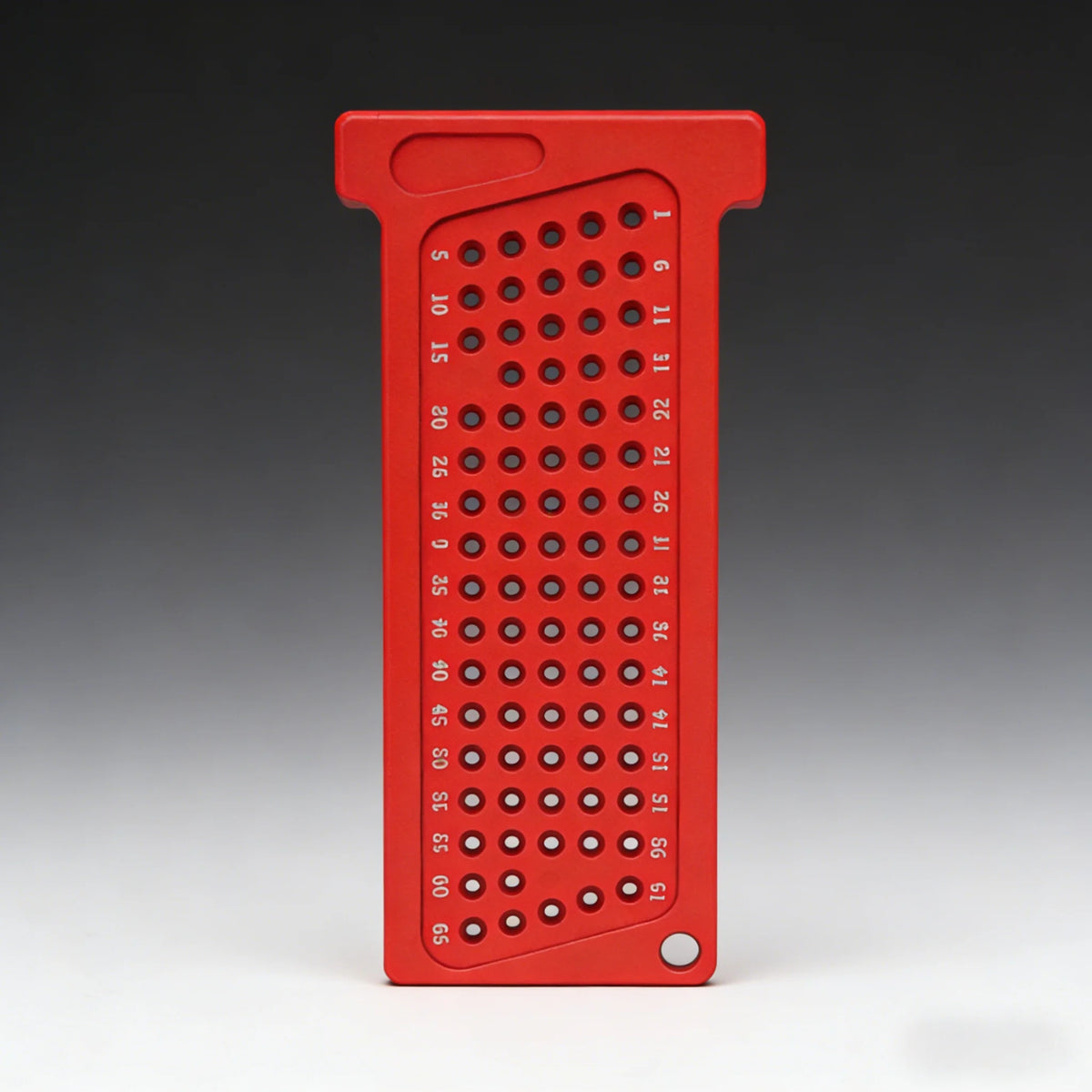 A red precision T-square ruler with numbered markings for carpentry and marking.
