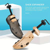 A wooden shoe expander tool is shown next to a shoe, demonstrating how to stretch and expand the feet.