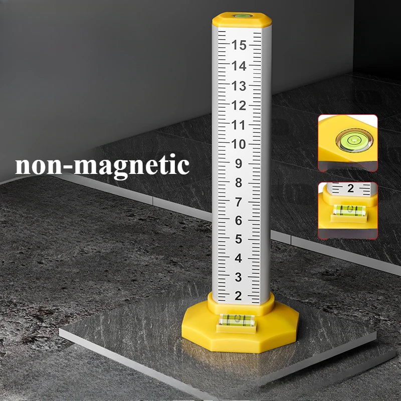 A yellow non-magnetic spirit level with a graduated scale used for precision ceiling leveling.