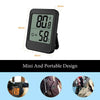 A black portable digital thermometer and hygrometer displaying a temperature of 80.8 degrees Fahrenheit.
