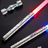A silver lightsaber with a glowing pink and blue RGB LED blade is shown against a dark background.
