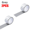 Two rolls of grey durable window screen repair tape shown on a white background.