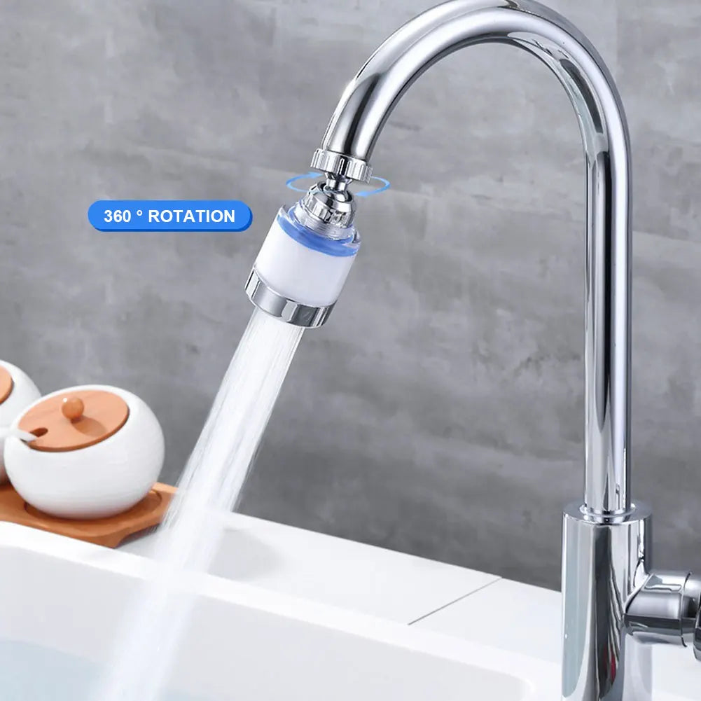 A close-up of a chrome faucet with a white filter attachment showing water flow, highlighting 360° rotation capability.