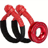 Red braided synthetic winch rope and recovery shackle coiled together