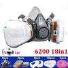 A set of half-face respirator and safety goggles for painting and work, including various sizes and pieces.