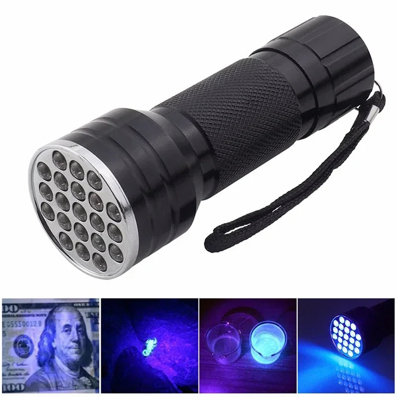 Lampe torche noire à lentille argentée et cordon flexible, utilisée pour la détection de lumière UV.